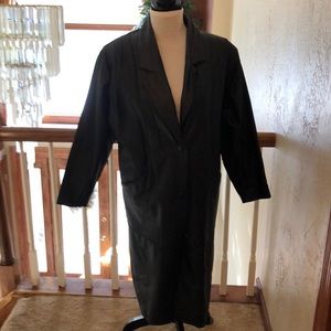 Wilson’s black leather long coat